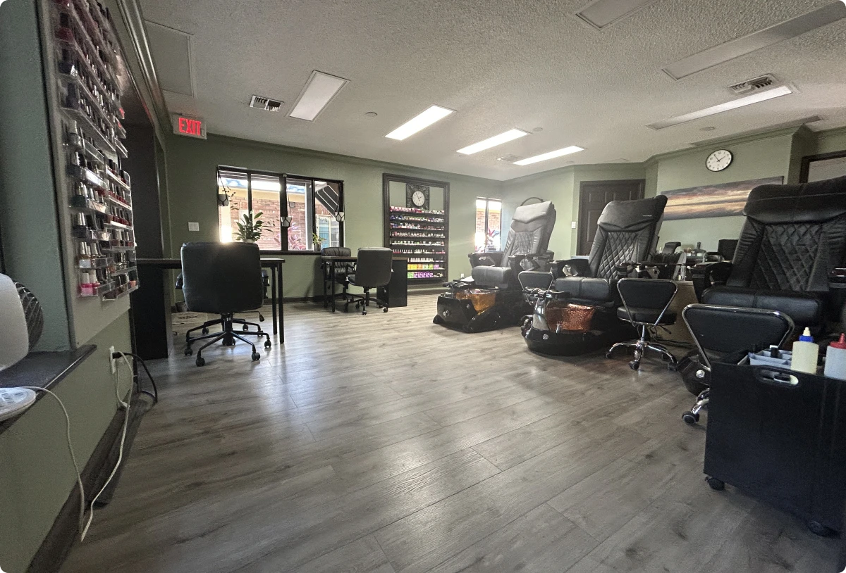 Nail salon interior with pedicure chairs